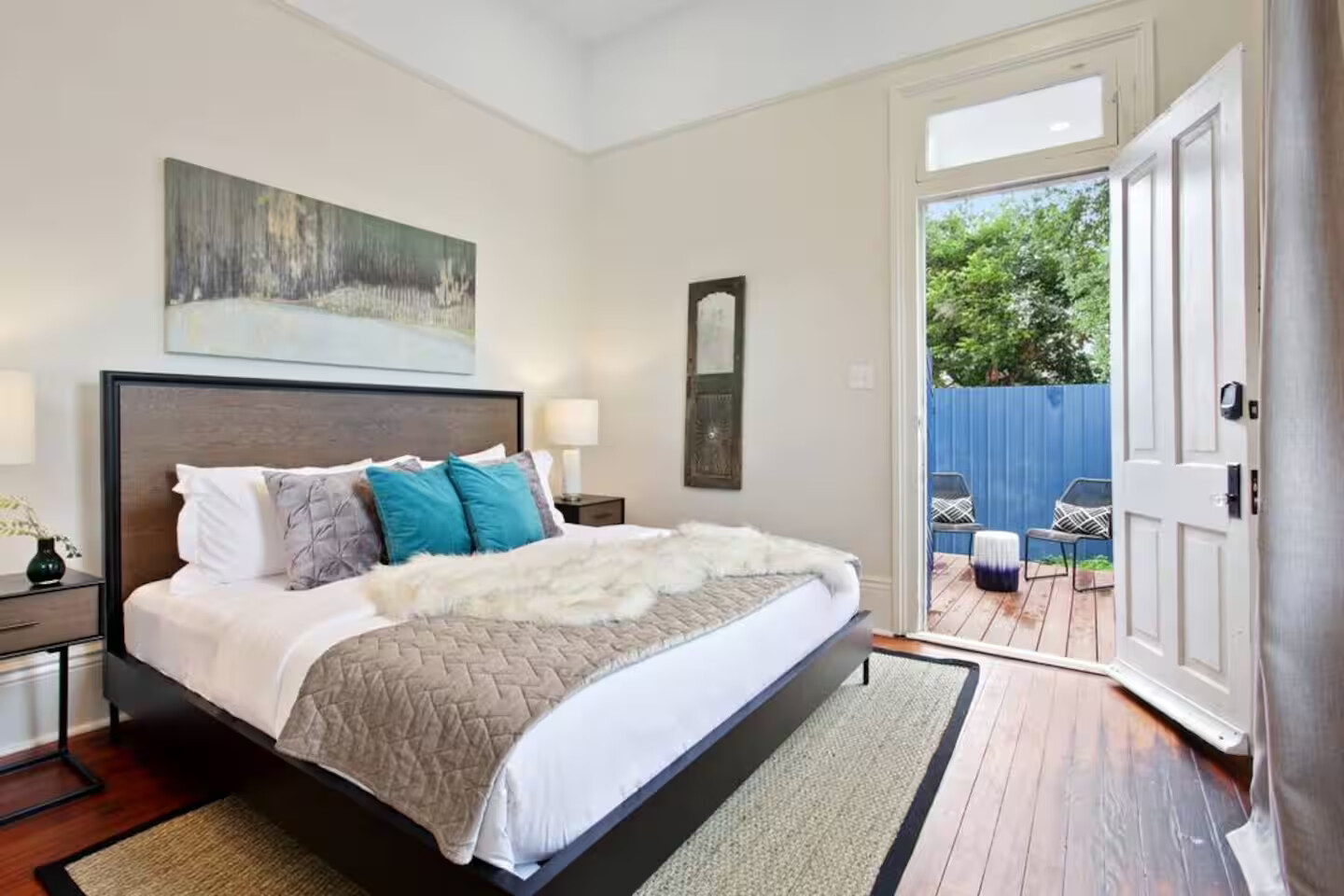 King bedroom with patio doors